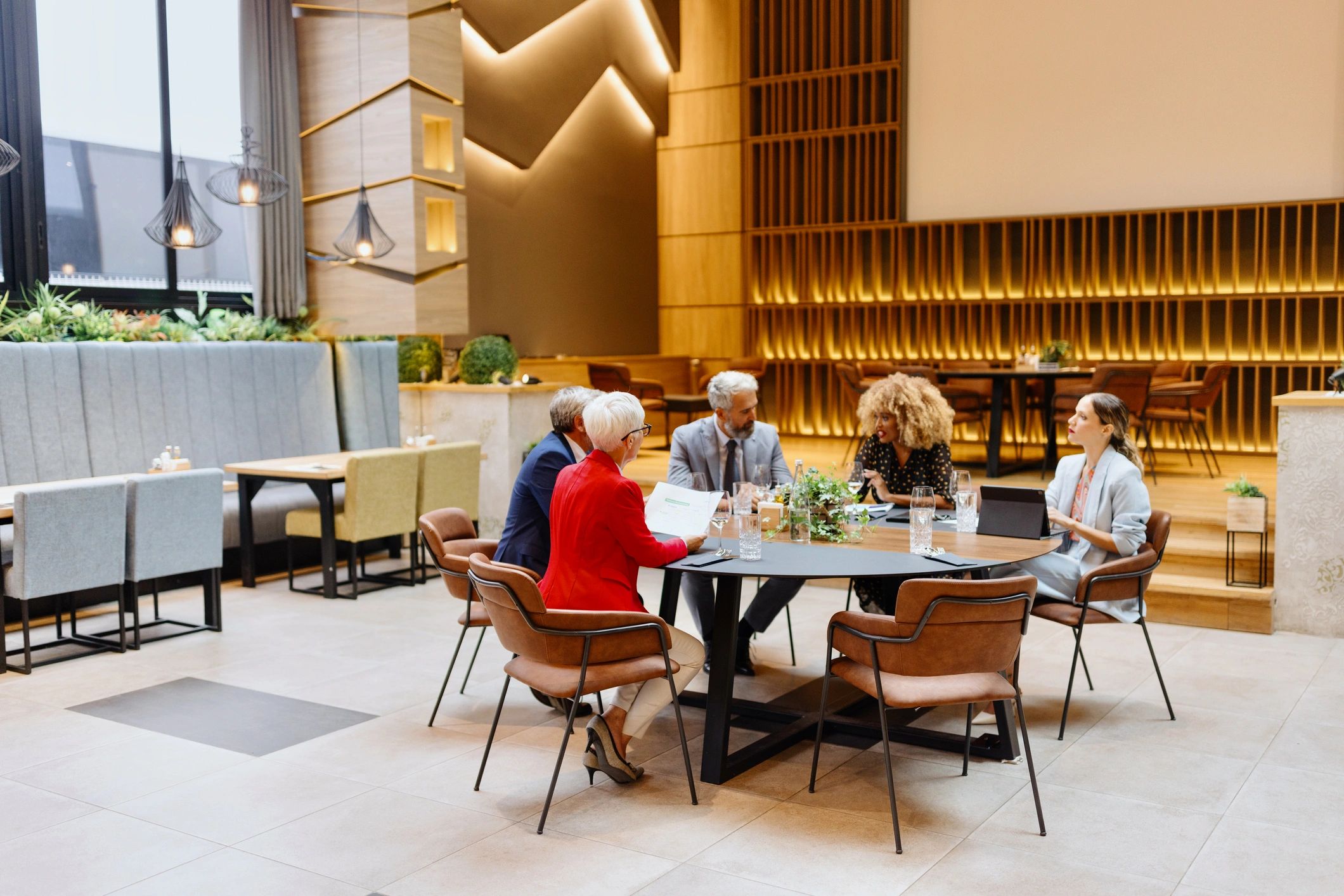 Corporate guests networking over a business lunch event