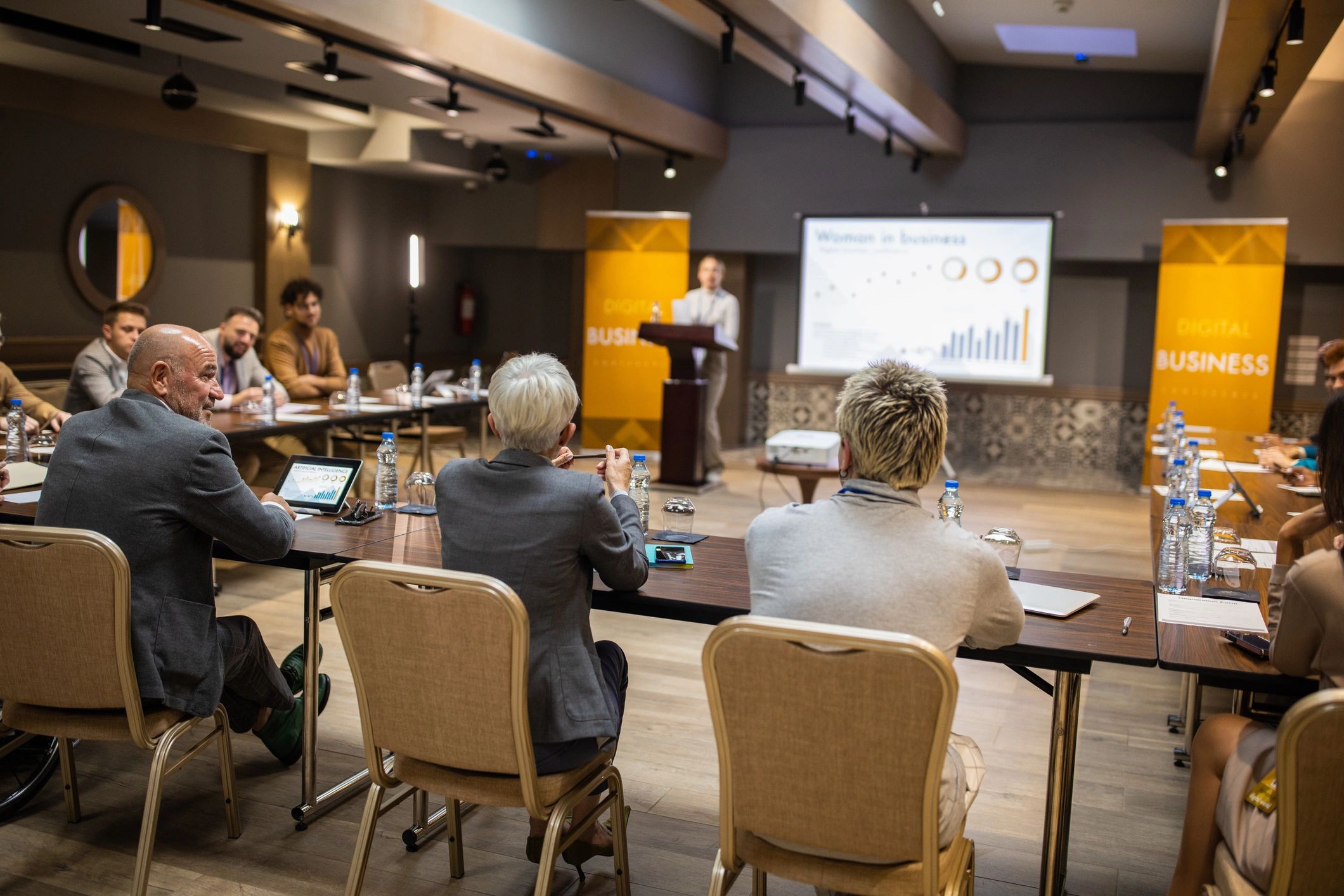 Corporate event audience during a professionally managed presentation