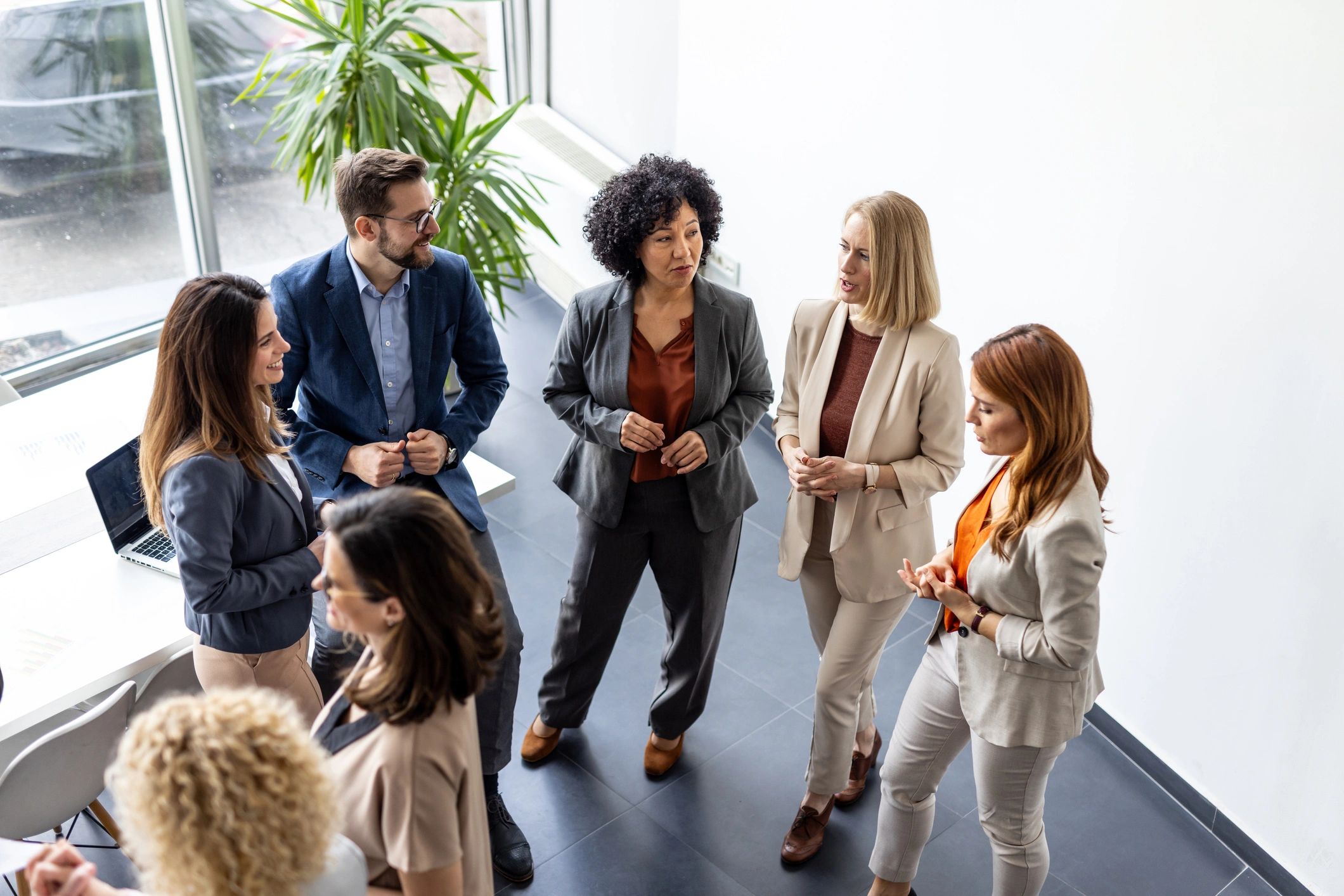 Professionals collaborating during a corporate event session